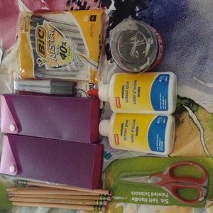 School supplies 2 pencil cases, 10 pens, 2 staples glue, 10 pencils, 2 sharpies